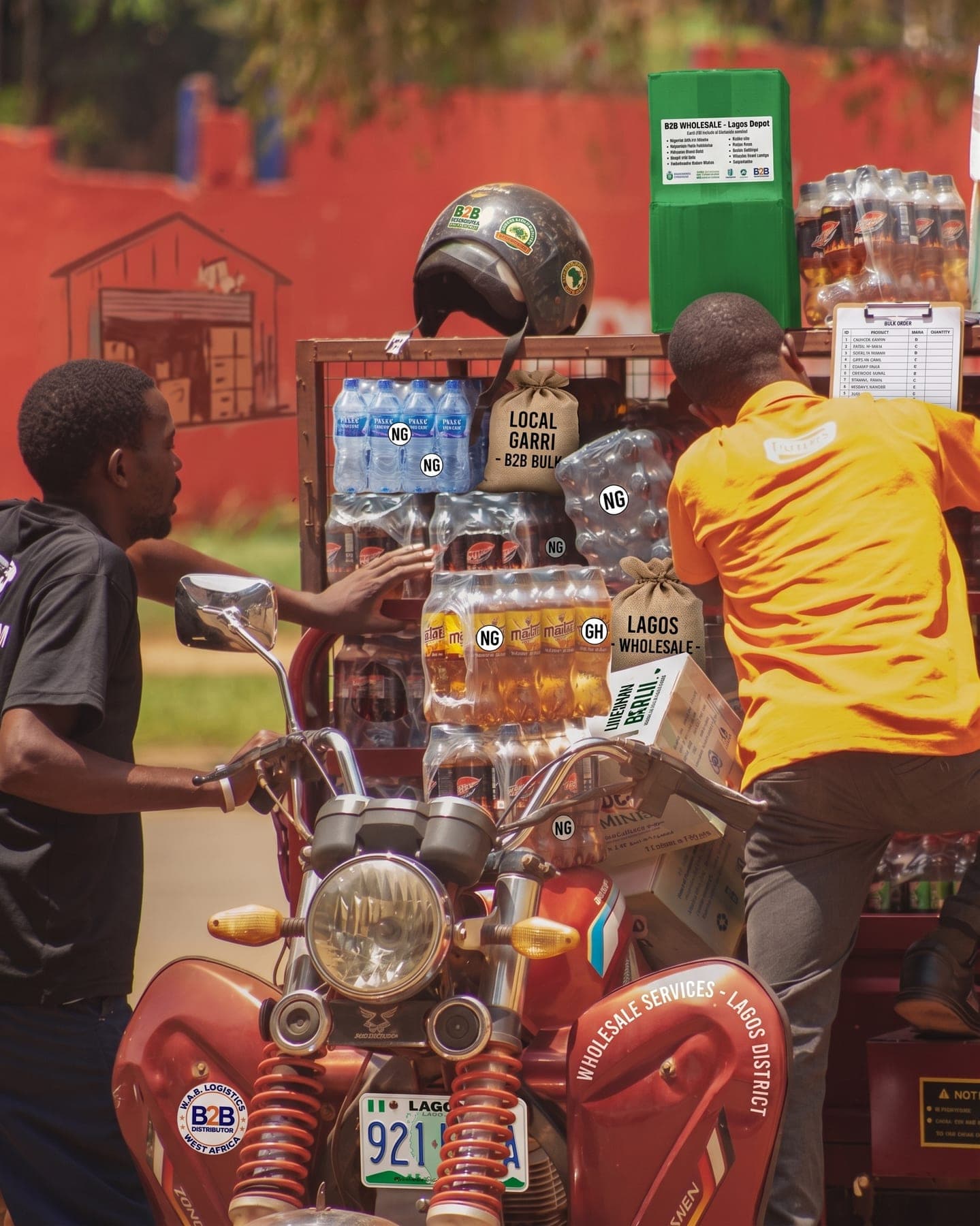 A three-wheeler loaded shoulder-high with wholesale crates, mid-drop. Distribution as a physical fact.